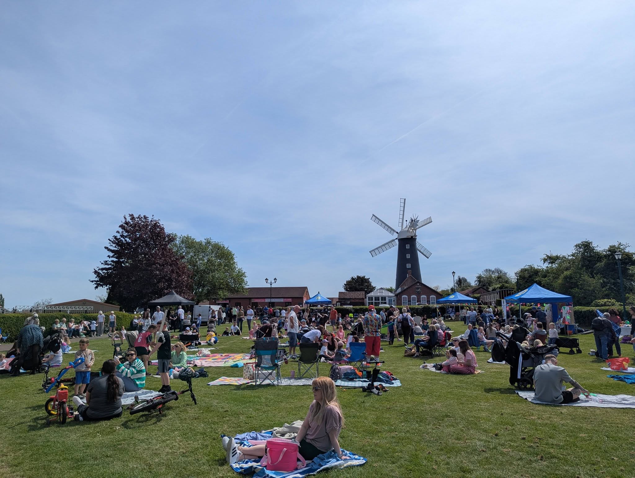 Visitors gathered for an outdoor event at Waltham Windmill